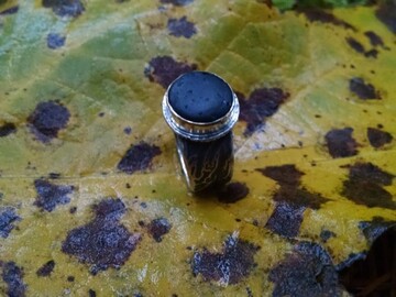 black beach stone ring and maple leaf